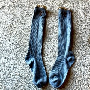 Gray boot socks with wooden buttons and lace trim
